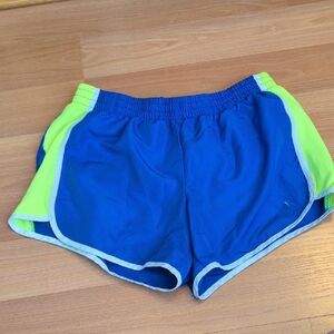 Danskin Now Women’s Athletic Running Shorts in Blue with Neon Yellow Panels